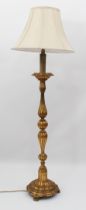 A giltwood standard lamp, mid-20th century - the fluted baluster column to a lappet moulded circular