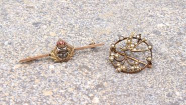 A 1920s 9ct rose gold and seed pearl swallow brooch - marked '9CT', 22mm diameter; together with a