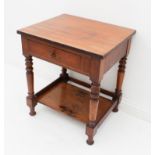 A mid-19th century mahogany two-tier side table - the rectangular top over a single frieze drawer,