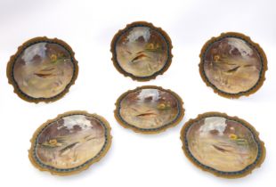 A set of six Limoges hand painted porcelain cabinet plates - early 20th century, iron red factory