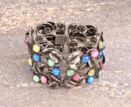 A mid-century silver and opalised glass bracelet - 1940s-50s, unmarked, of openwork foliate