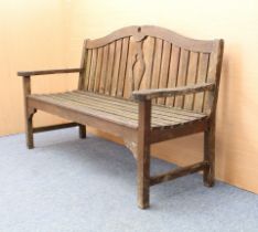 A hardwood garden bench - by Pagoda Lifestyle, the shaped slat back with central, pierced splat, 155