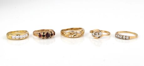 Five 9ct gold stone-set rings (gross weight 8.1g)