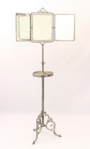 A cast metal and alloy triple-fold shaving mirror on stand - mid 20th century, the three rectangular