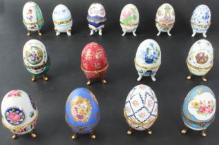 Fourteen gilt-metal-mounted collectors' china eggs (each approx. 10 cm high)