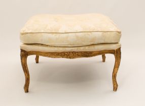A French Hepplewhite-style giltwood stool - late 20th century, of serpentine rectangular form,