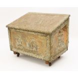 A 1920s brass mounted coal box - the pressed brass mounts repoussé decorated with galleons at sea,