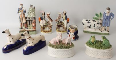 Two Rye Pottery figures - one of a farmer with a Sussex pig, 23.5 cm high, and another of a