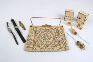 A vintage 1950s floral beadwork evening bag - with gilt brass and faux-mother of pearl frame, pale