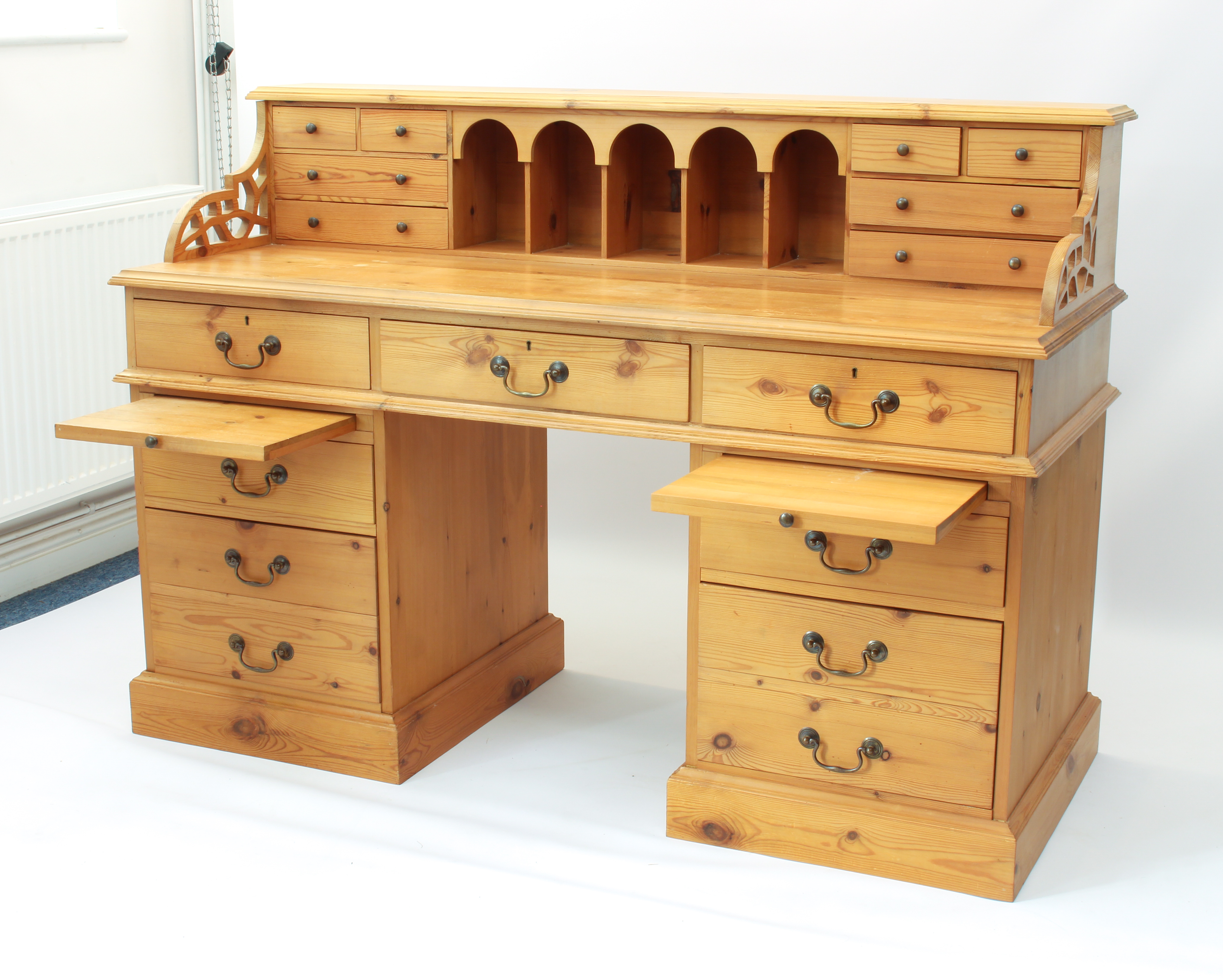 A large pine double pedestal desk - the raised gallery back with five arched pigeonholes flanked - Image 3 of 3