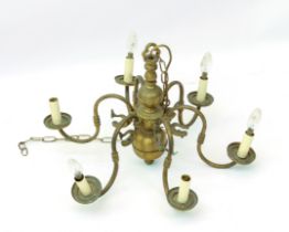 A Dutch 18th century style brass six light chandelier - 61 cm diameter.