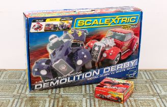 A boxed Scalextric QuickBuild Demolition Derby Metal Alien Vs White Skull set - 1/32 scale,
