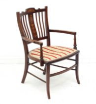 An Edwardian walnut and marquetry open armchair - (WH 51.5 x 77cm.)