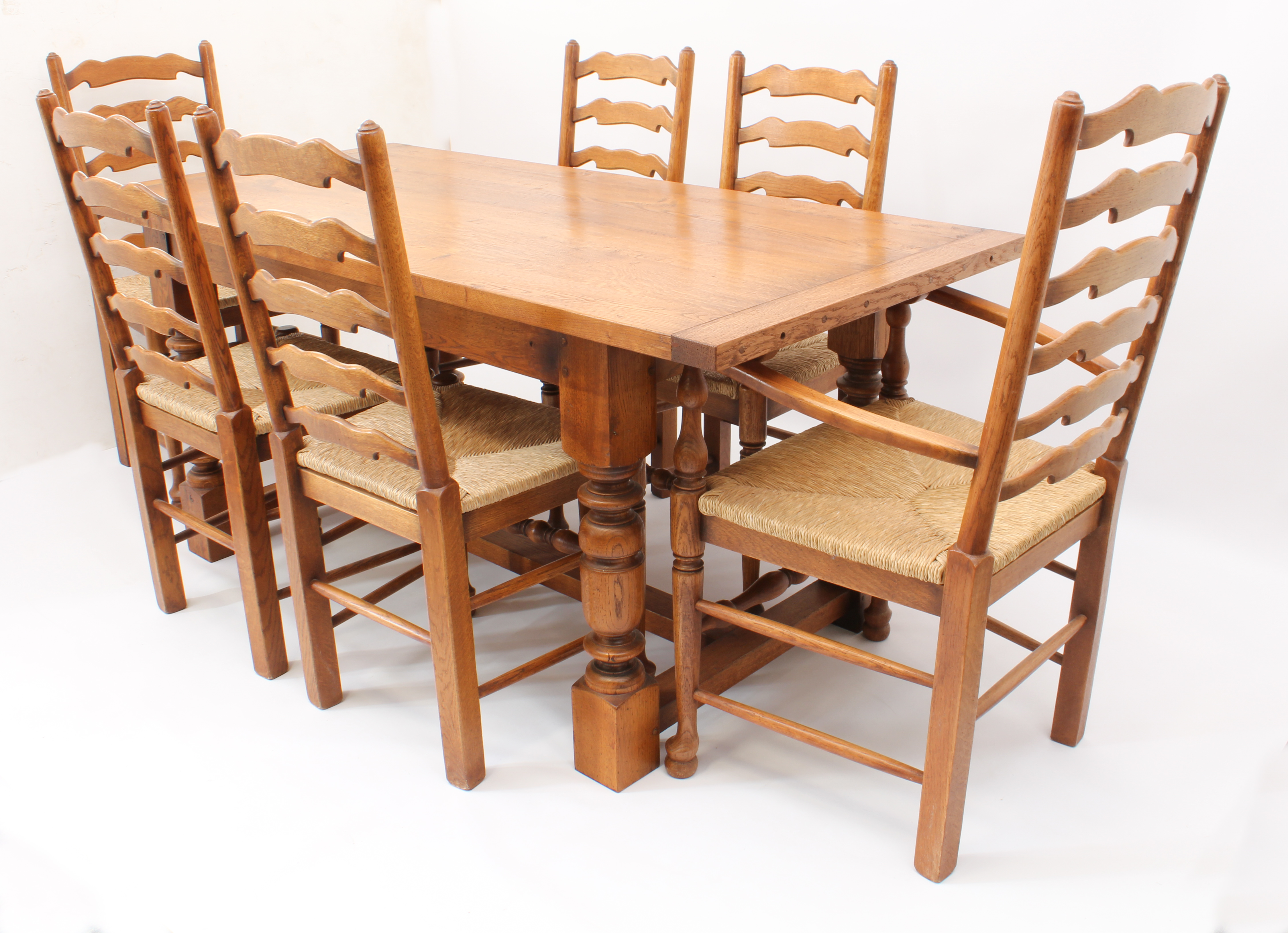 An oak extending refectory style dining table and six ladderback chairs - in the 18th century style, - Image 2 of 9
