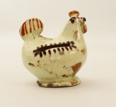 An antique glazed terracotta hen moneybox - probably 19th century, chips to beak and base, 9.2 cm