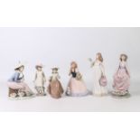 Six porcelain figures by Lladro, Nadal and Nao - comprising Nao 1126 'April Showers' and 'Flowers