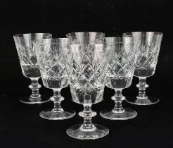 A set of six cut glassware goblets