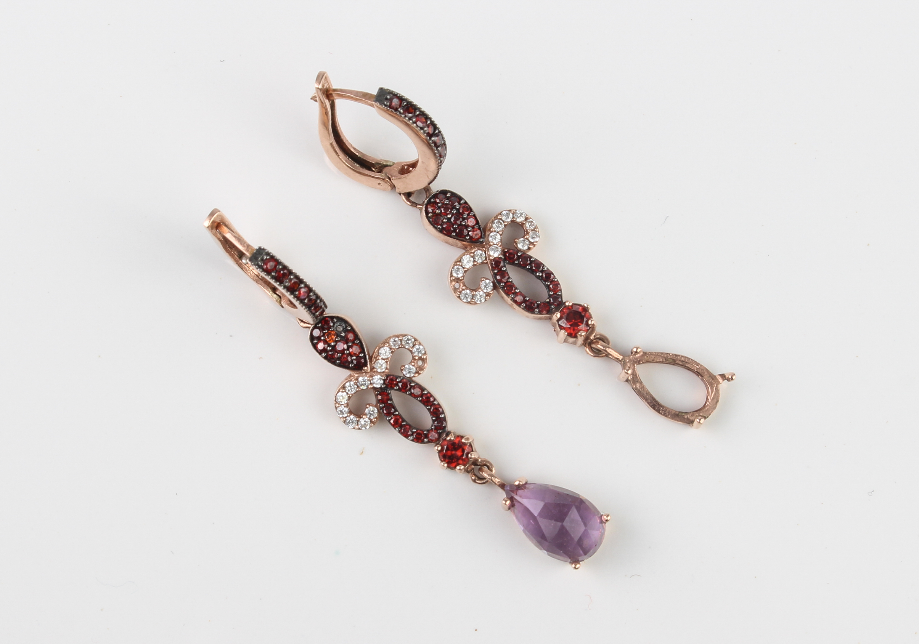 A pair of 8ct rose gold, white stone, amethyst and garnet drop earrings - marked '333', with post - Image 3 of 3