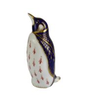 A Royal Crown Derby Penguin paperweight - without stopper and scratches through mark, second
