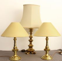 A pair of brass table lamps - 34 cm high, plus shades; together with a giltwood table lamp in the