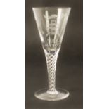 A commemorative airtwist wine glass by Stuart Crystal - the conical bowl wheel engraved 'York A.D.71