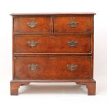 A reproduction Georgian-style burr walnut and yew chest of drawers - late 20th century, of small