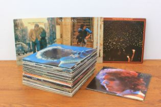 A box of approximately 60 vinyl LP records / albums - to include  Bob Dylan (5), David Bowie (2),
