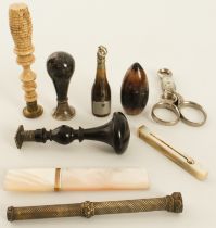 Nine pieces of bijouterie: an early 20th century horn novelty cigar-cutter in the form of a