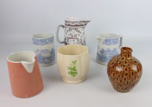 A small group of ceramics including an Irish vase and jugs etc.