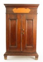 A miniature hardwood apprentice piece style cupboard - probably Oriental, late 20th century, the