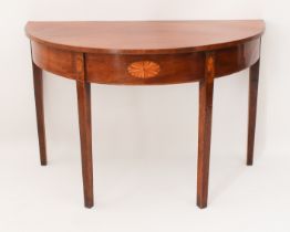 A George III inlaid mahogany demi-lune table - raised on square tapered supports headed by inlaid