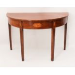 A George III inlaid mahogany demi-lune table - raised on square tapered supports headed by inlaid