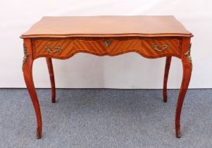 Two pieces: 1. a reproduction French 19th century style mahogany and kingwood serpentine writing