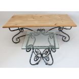 A wrought iron and waxed coffee table - the moulded, rectangular top on a gunmetal painted wrought