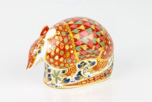 A Royal Crown Derby Armadillo paperweight - with silver stopper and red printed factory marks, 8.