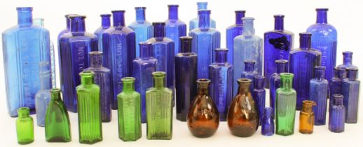 A collection of blue glass antique Poison bottles - sizes ranging from 3.9 cm to 18.1 cm high,