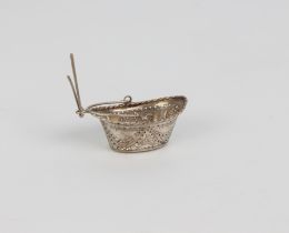 An early silver tea infuser.