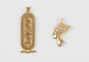 Two Egyptian 18ct yellow gold pendants - one of tablet form with hieroglyphics and a filigree