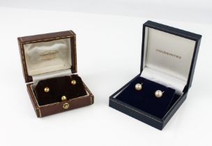 Two cultured pearl and 9ct gold earrings - both with 7mm pearls, one in white gold, the other yellow