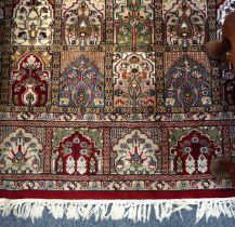 An Indian panelled wool rug - Rajestan, early 21st century, the main field and border with