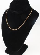 A 9ct yellow gold curb link chain - stamped '375', 39.75 cm long.