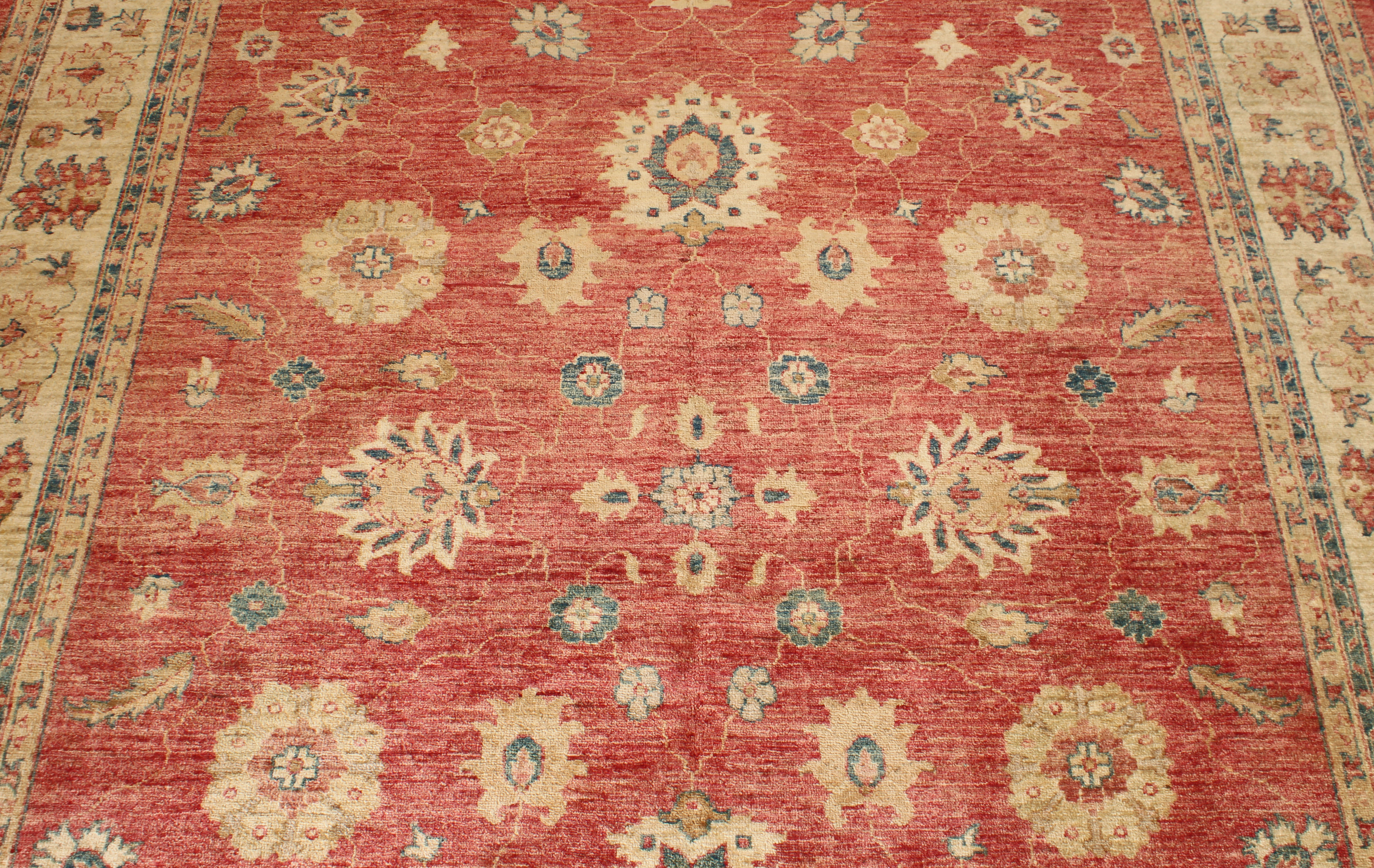 A hand knotted wool Afghan Ziegler rug - with typical all over floral decoration on a madder ground, - Image 4 of 5