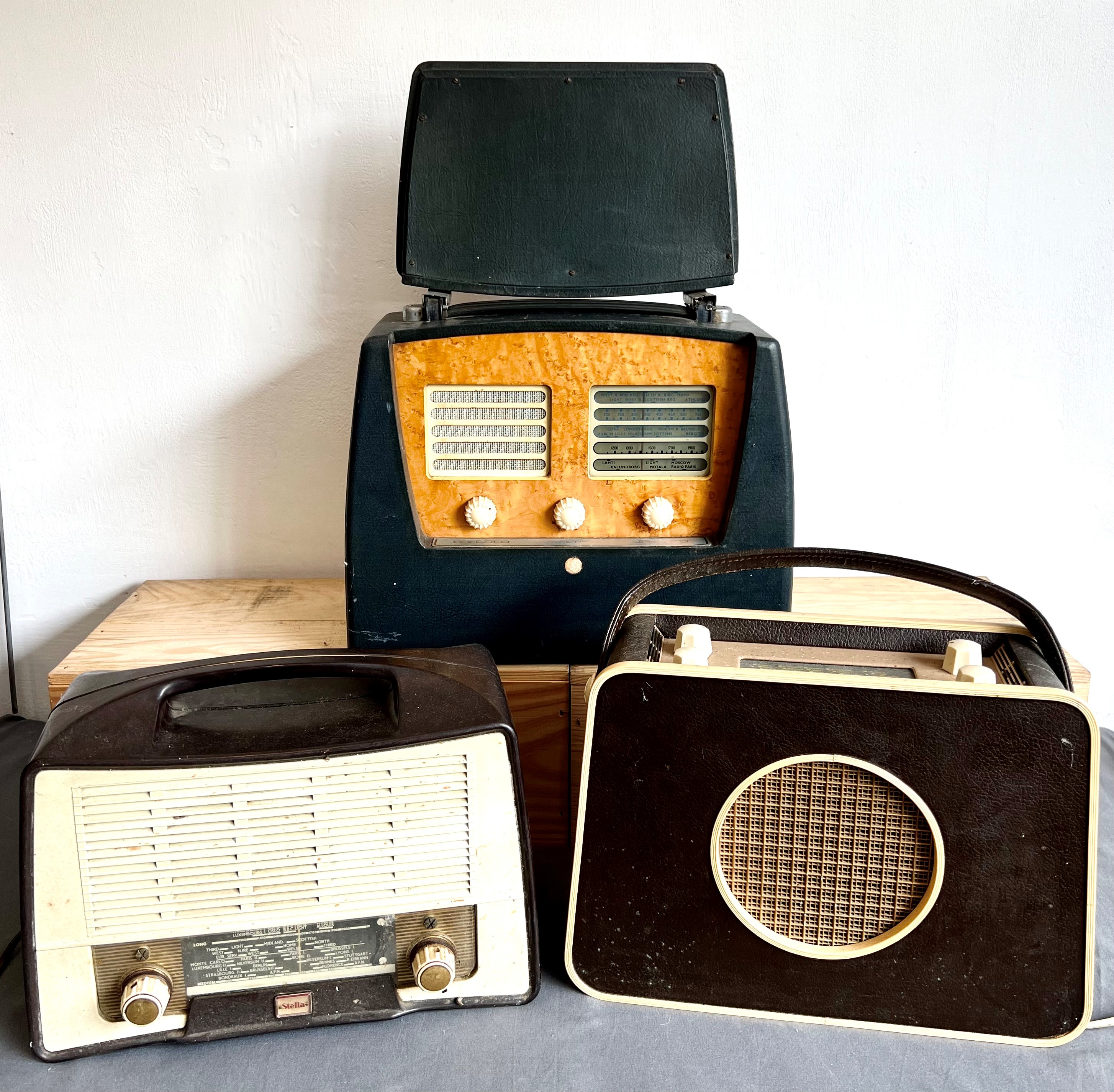 Three 1950s valve portable radios - comprising a Stella bakelite radio, model ST105U; a Murphy