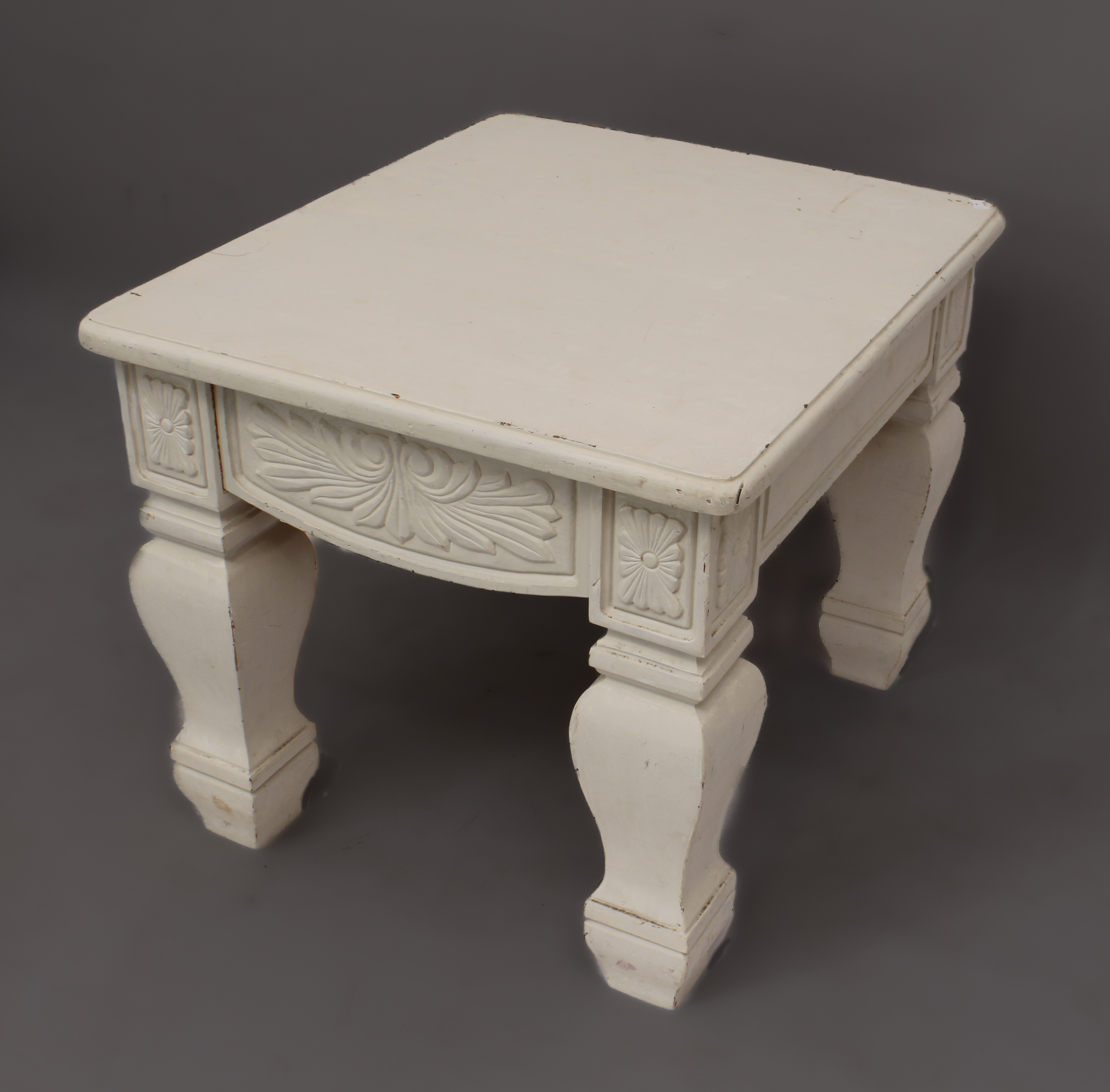 A white-painted rectangular coffee table - late 20th century, pine and oak, with a panelled frieze