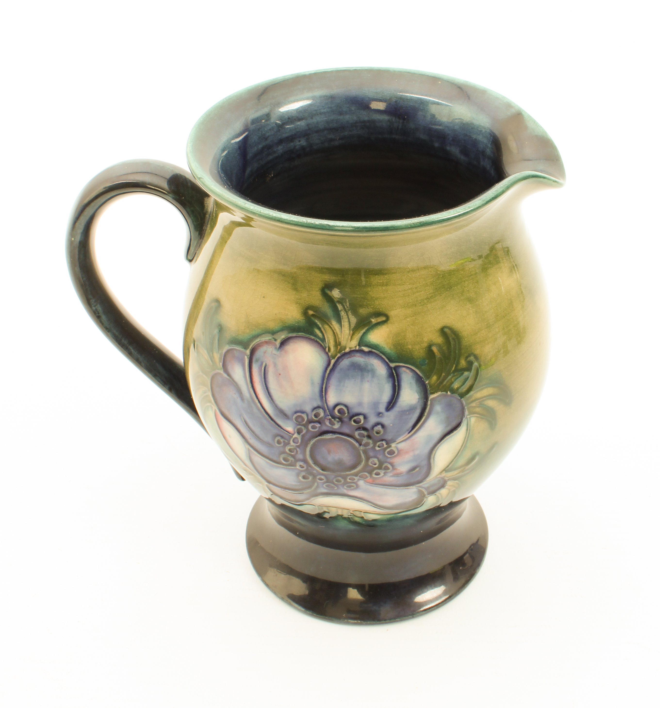 A Moorcroft jug in the 'Anemone' pattern - impressed factory mark with facsimile signature, also - Image 3 of 4