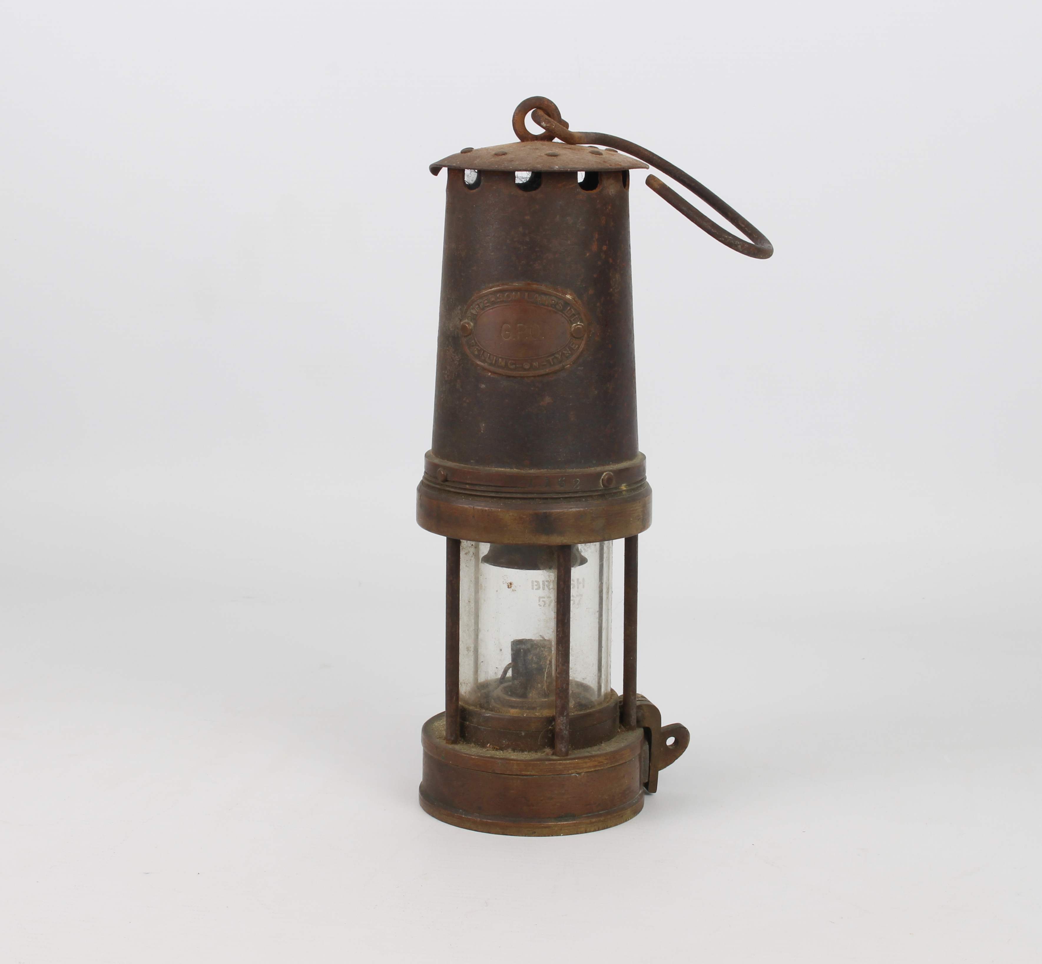 A Patterson Lamps Ltd. miners style safety lamp - the brass maker's plaque stamped 'G.P.O.', in