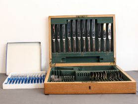 An oak cased canteen of silver plated cutlery for six place settings - in an Art Deco style pattern,