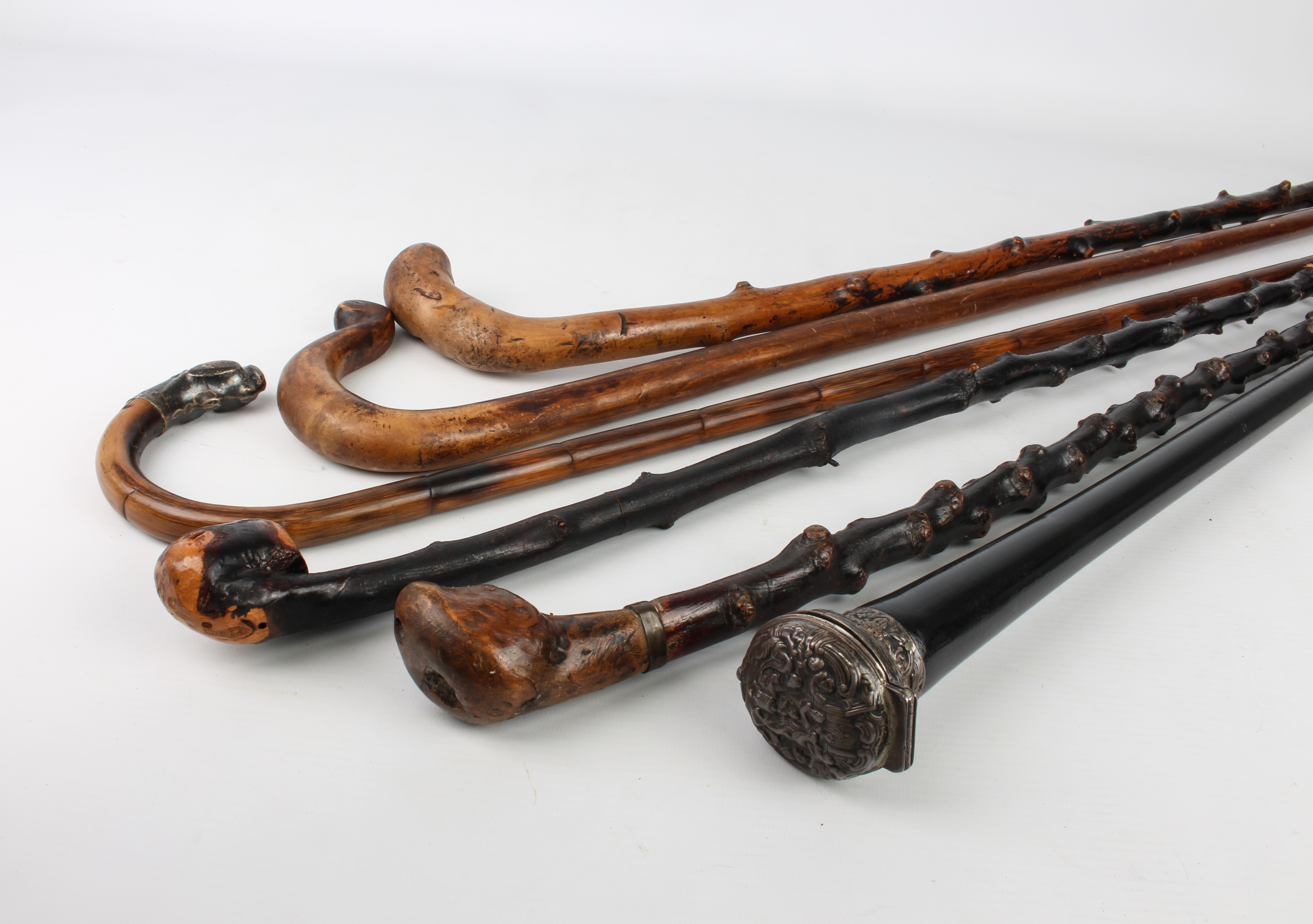 A group of antique walking sticks and canes - including a novelty ebonised cane with hinged silver - Image 2 of 2