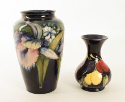 A Moorcroft ovoid vase in an Orchid pattern - late 1940s-50s, impressed factory marks and painted