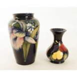 A Moorcroft ovoid vase in an Orchid pattern - late 1940s-50s, impressed factory marks and painted